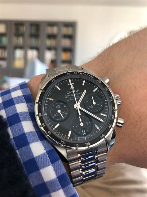 omega speedmaster 38mm review|omega speedmaster price chart.